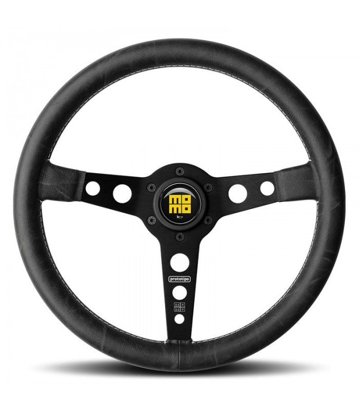 "Momo Prototipo Heritage" steering wheel, Ø350mm, with matte black spokes, aged black leather, and white stitching. - 1