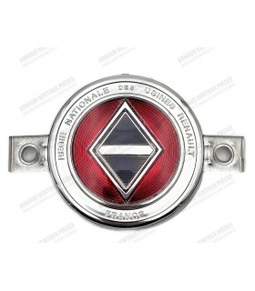 Monogram front face round plastic 1954